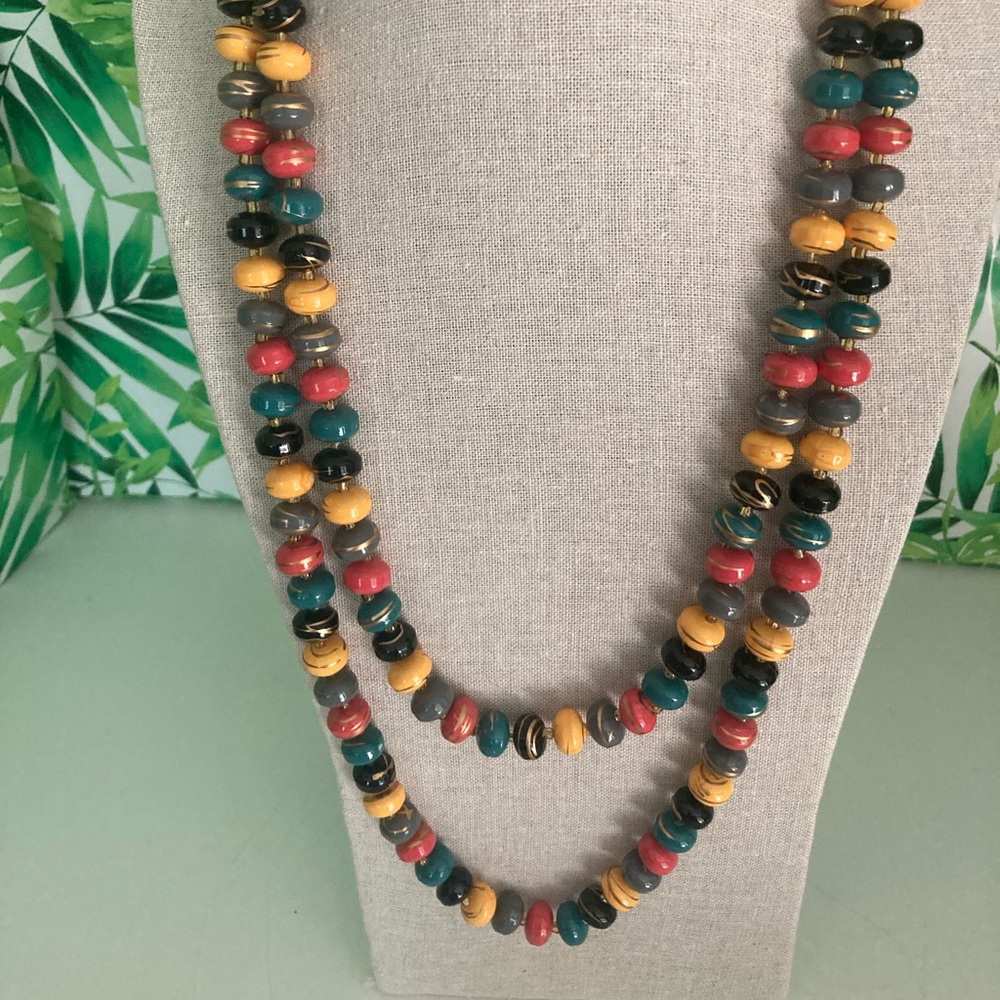 Boho style vintage necklace. The length is 52 inches